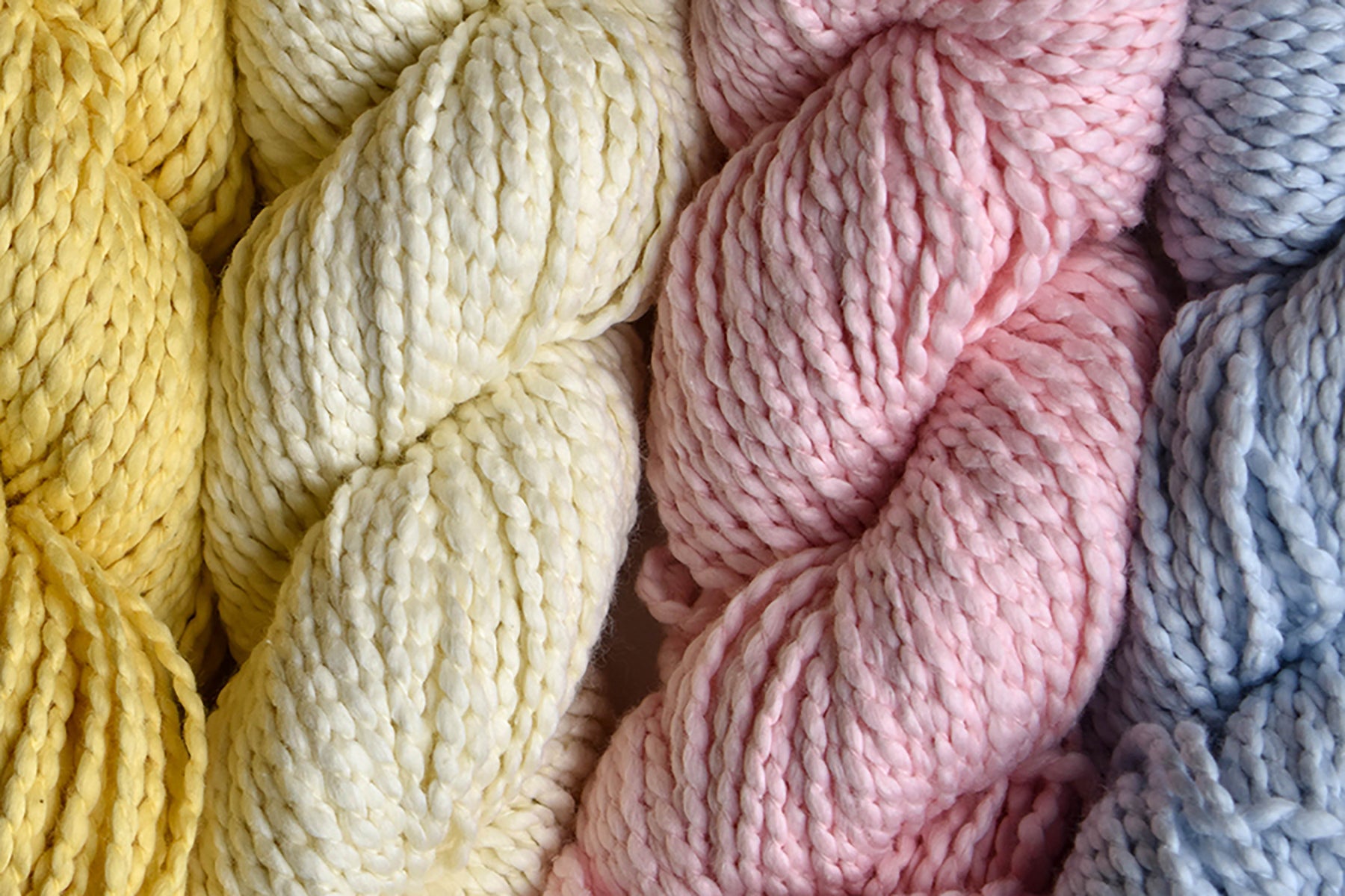 Designer Inquiry Image | Flat Lay of Different Color Yarn from Universal Yarn