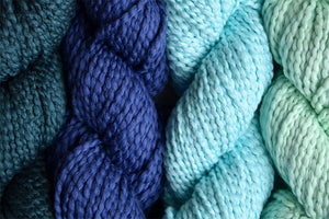 Influencer Inquiry Image | Flat Lay of Different Color Yarn from Universal Yarn